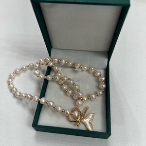 Dolphin tail freshwater necklace